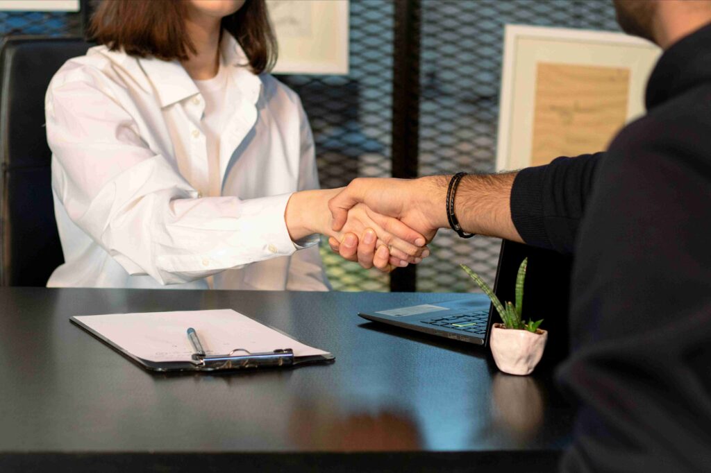Mortgage Refinance UAE, meeting, people handshake